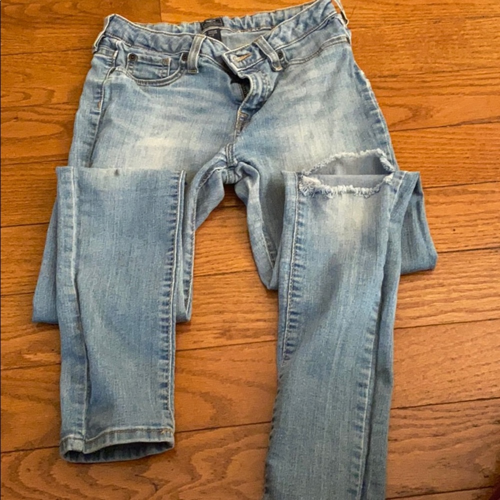 Gap denim jean with left leg destruction